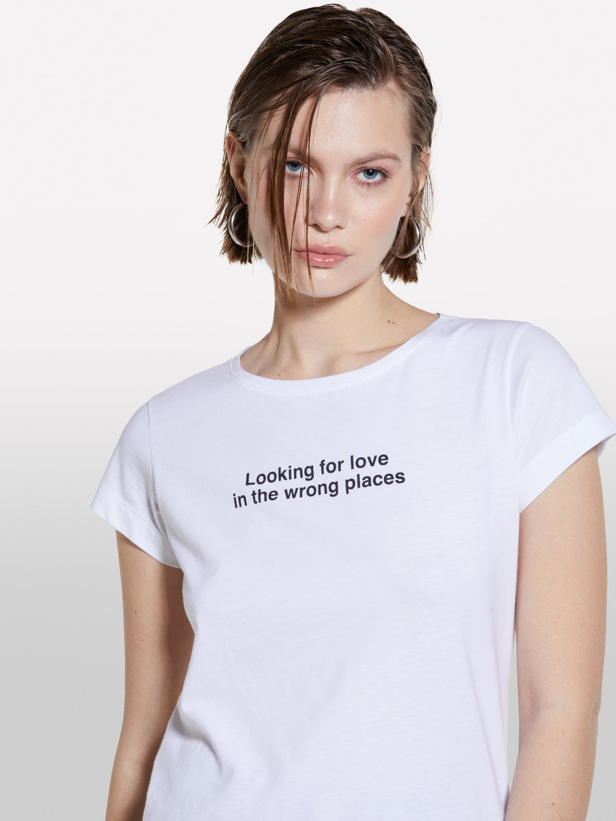White t-shirt with text print