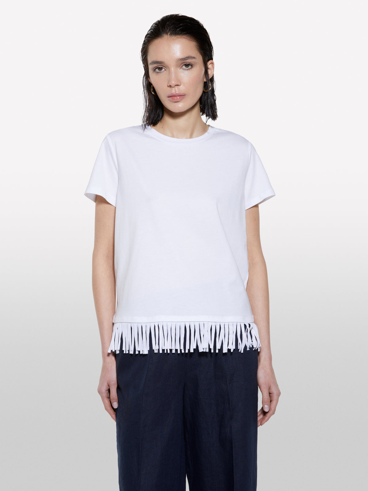 White t-shirt with frayed bottom