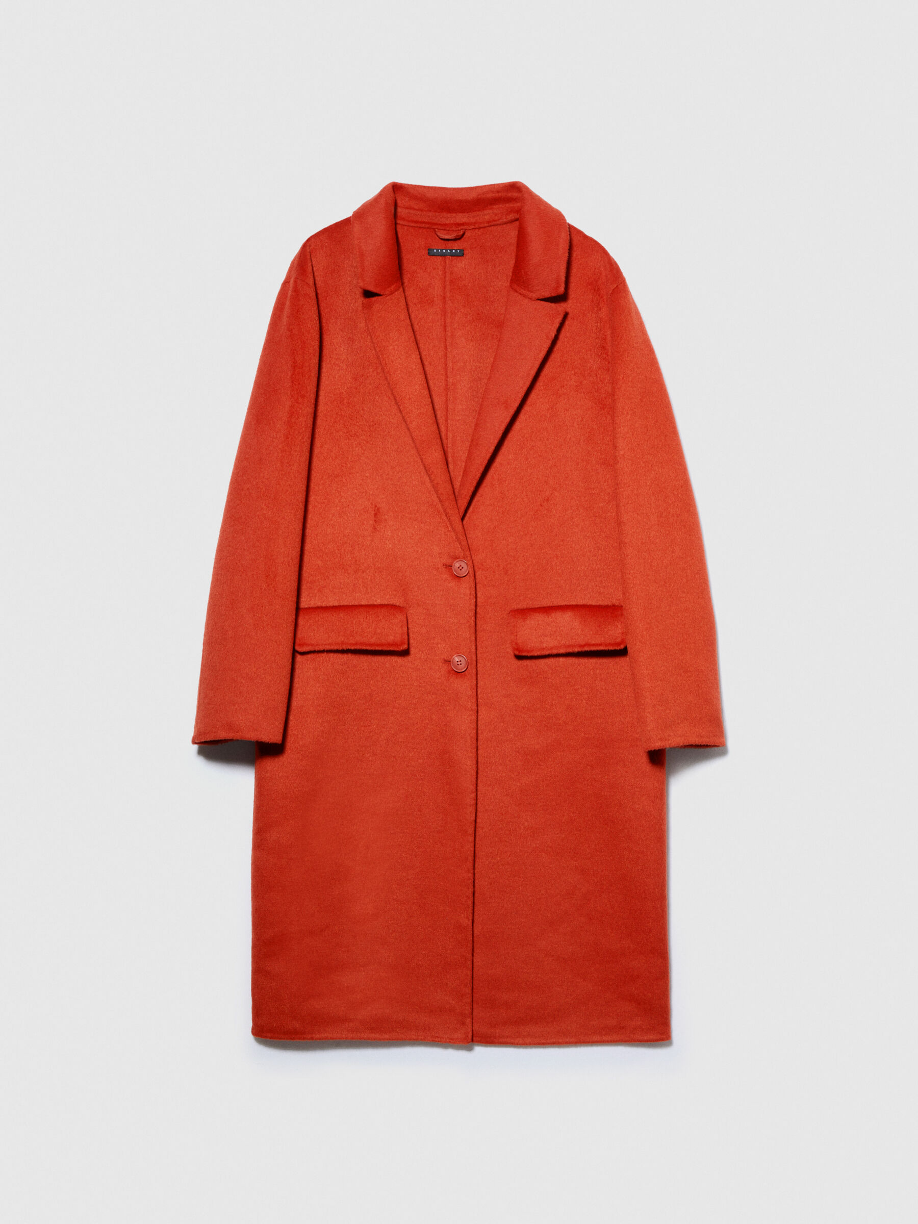 Longueur store manteau femme