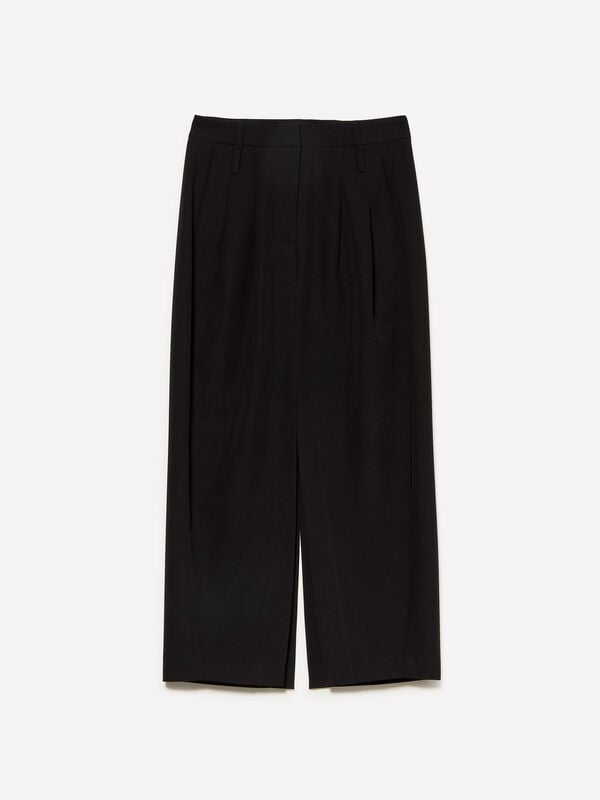 Jupe midi noire avec fente Jupe midi noire avec fente - jupes midi, jupes mi-longues femme | Sisley