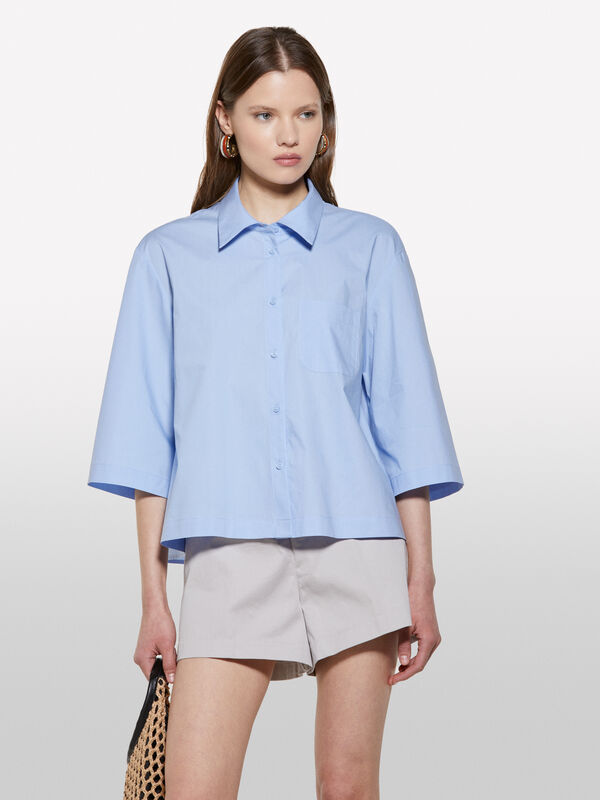 Chemise courte bleu clair à plis - chemises pour femme | Sisley
