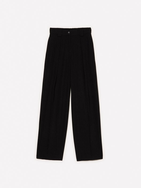 Pantalon palazzo noir à plis Pantalon palazzo noir à plis - pantalons palazzo pour femme | Sisley