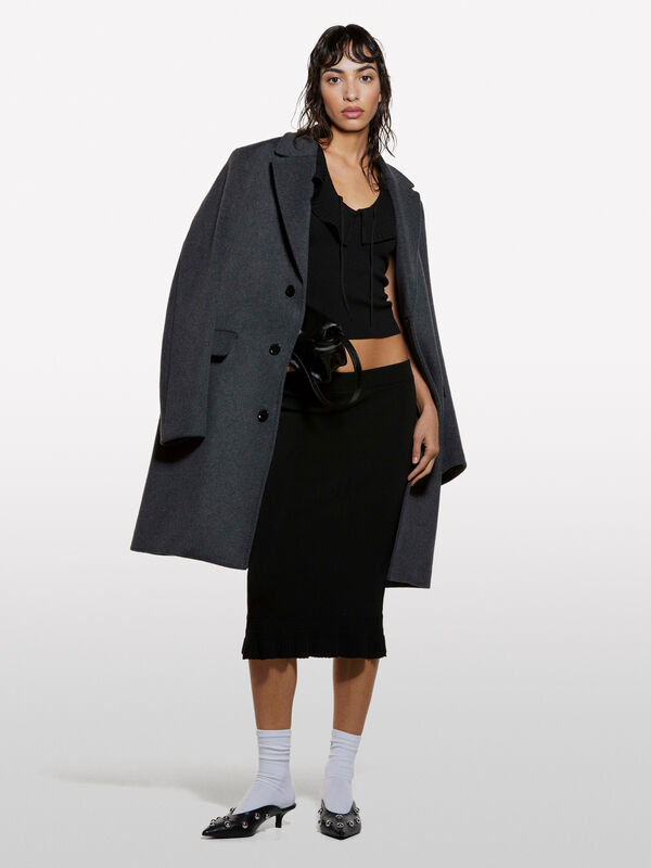 Jupe en tricot noir à volants - jupes midi, jupes mi-longues femme | Sisley